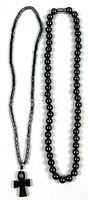 Both hematite necklaces side by side showing bead styles and clasps