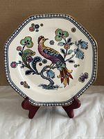 Full view of octagonal Arragon pattern plate on stand