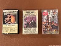 Front view of all three cassette tapes laid out