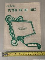 Front cover showing title, artwork, scale for size