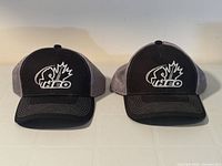 Both HEO caps front view