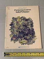 Front cover with tape measure showing approximate height