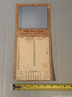 Full view showing mirror and calendar sheet with tape for scale