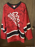 Front view of signed red Ontario jersey