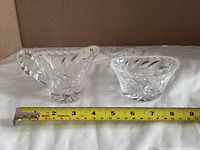 front view of creamer and sugar bowl with tape for length