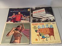 Front covers of all four LPs