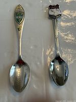 Both souvenir spoons front view
