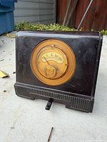 Front view showing Bakelite radio and dial
