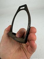 Side view of full stirrup highlighting arch and tread