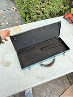 Toolbox open showing interior and handle