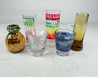 Front view of all six shot glasses in lot