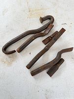 All four forged steel pry bars/chisels on tabletop