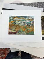 Full view of Ruth Leaf woodblock print on stack of papers