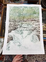 Full view of unframed woodblock print on paper