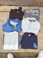 All seven garments laid out