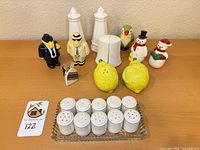 Group shot showing all shakers, glass tray and toothpick holder