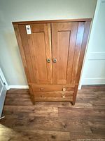 Front view of Daniel's Amish solid wood armoire, doors closed