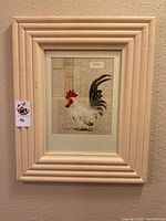 Front view of framed rooster artwork showing image, mat and frame