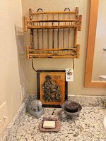 Lot overview showing bamboo shelf, plaque, elephant figurine, candle bowl, soap dish