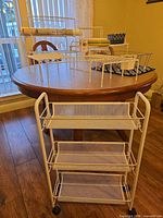 Entire lot displayed on table with rolling cart and organisers