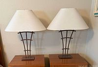 Both matching lamps on nightstands showing full design