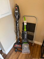 Full view of Shark Rocket vacuum, Bissell TurboClean carpet cleaner and Cosco step stool