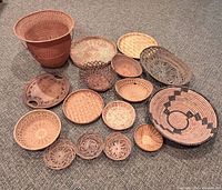 All 16 baskets arranged together on floor