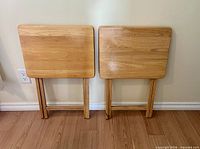 Both tables folded, front view