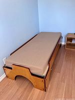 Bed frame with mattress in place