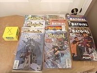 Front view of first stack of Batgirl comics