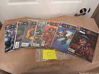 Seven bagged Crimson comics laid out side by side