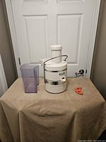 Juicer, pulp container, crescent tool overview