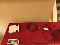 Console, HDMI cable and USB power cable laid out