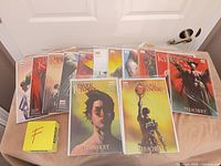 Spread of bagged The Dark Tower comics, front two copies of Treachery visible