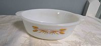 Top and side view of milk glass bowl with wheat decal