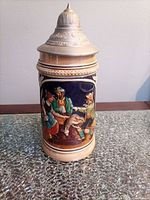 Front view showing alpine scene and lid