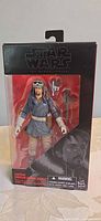 Front of boxed Captain Cassian Andor figure showing accessories