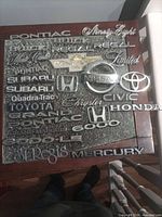 Full board view of assorted emblems showing quantity and variety