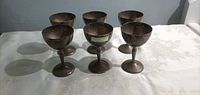 Front view of all six goblets on table