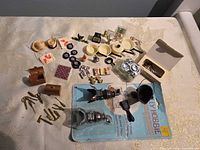 Overall view of all miniatures spread on table