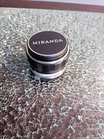 Lens with Miranda cap, top view