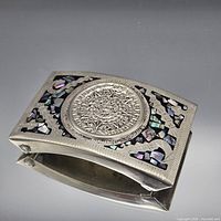 Top view showing Aztec calendar medallion and abalone shell inlay