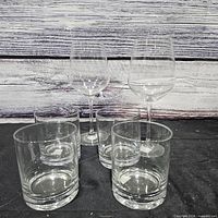 Group view: two wine glasses and four tumblers