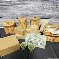 Group shot of all baskets, ceramic pieces, and Longaberger boxes