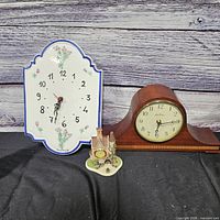 All three clocks: ceramic wall, wooden mantel, resin cottage
