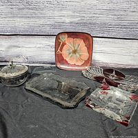 Group shot showing all glass and crystal items on black cloth background