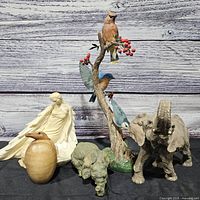 Group shot of all five figurines