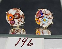 front view of cufflinks showing glass design