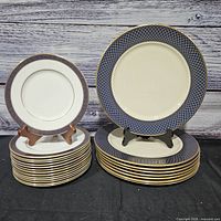 Stacks of dinner and salad plates showing pattern and quantity