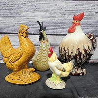 Group shot of all four poultry figurines